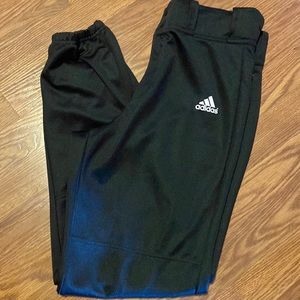 Men size medium, elastic leg, black baseball pants